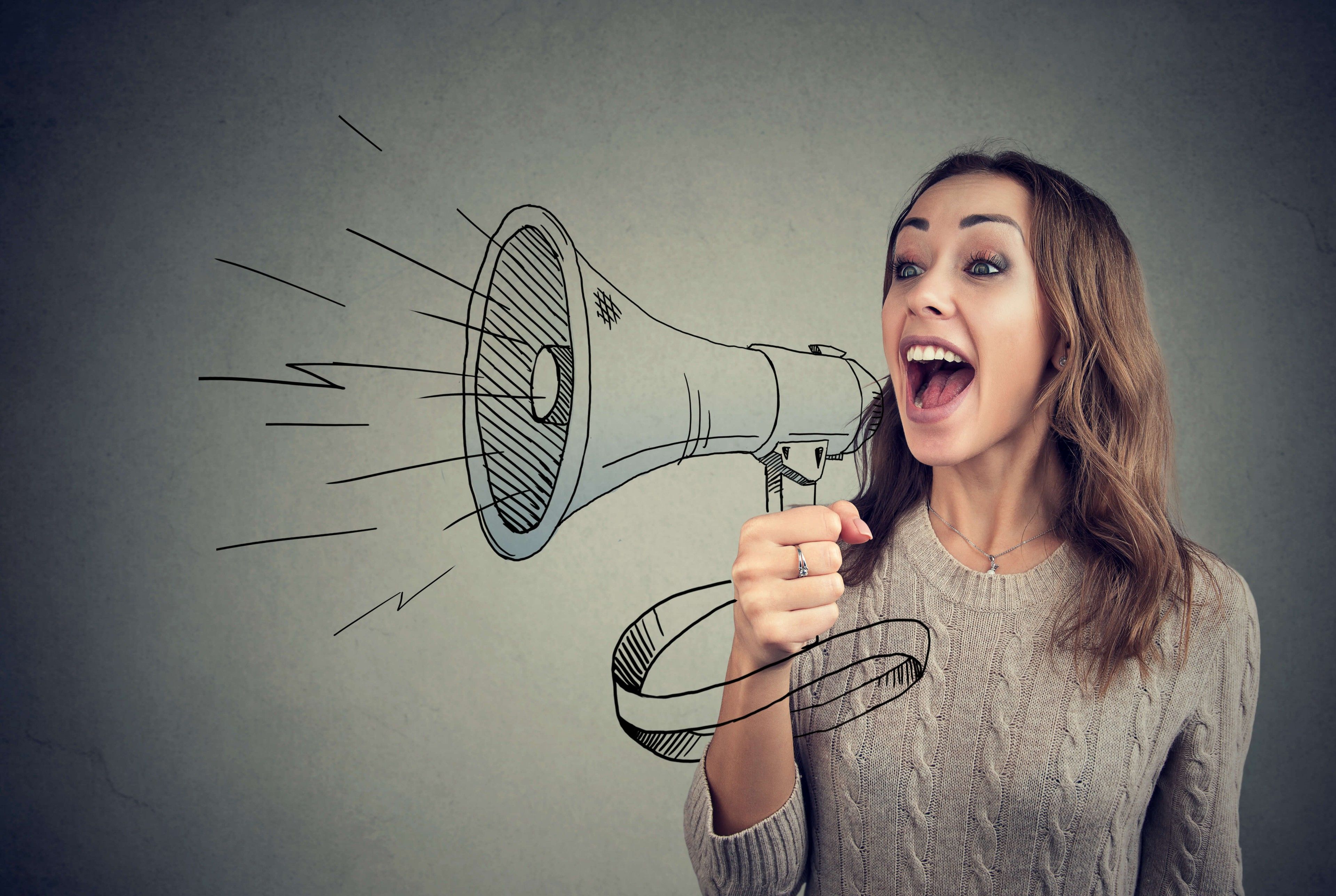 A women holding a megaphone 